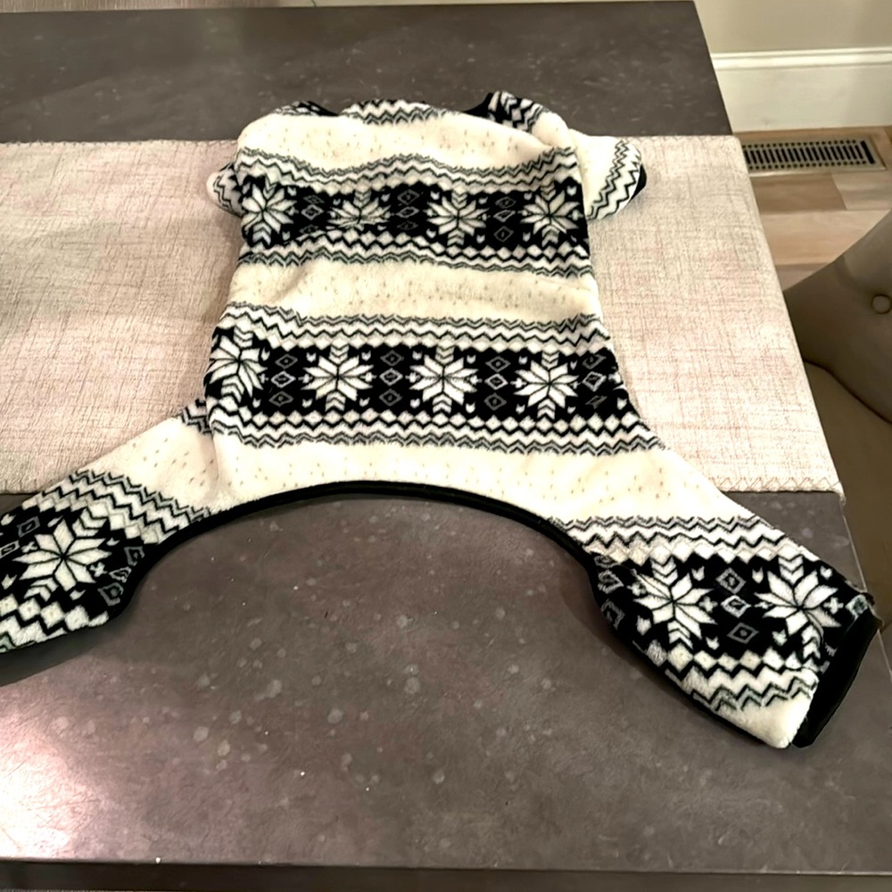 Doggy outfit size xl but fits more like a small/medium tbh. BNWT